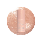 Cookie Swap Gel shimmery beige champagne gel polish bottle on sparkling background for a polished manicure