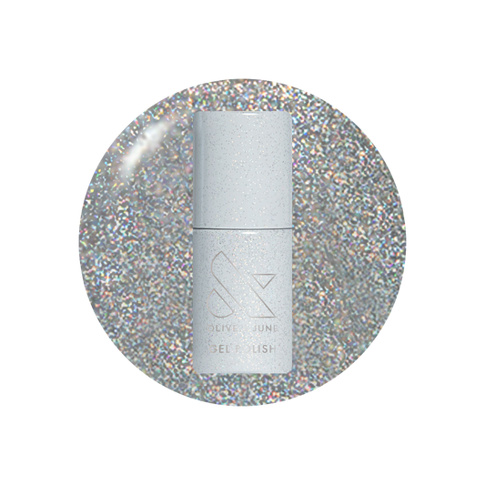 Silver nail polish bottle on a glittery silver background