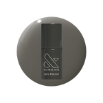 Is It Smoky In Here? Gel polish bottle with deep charcoal gray for a sleek, long-lasting mani by Olive and June