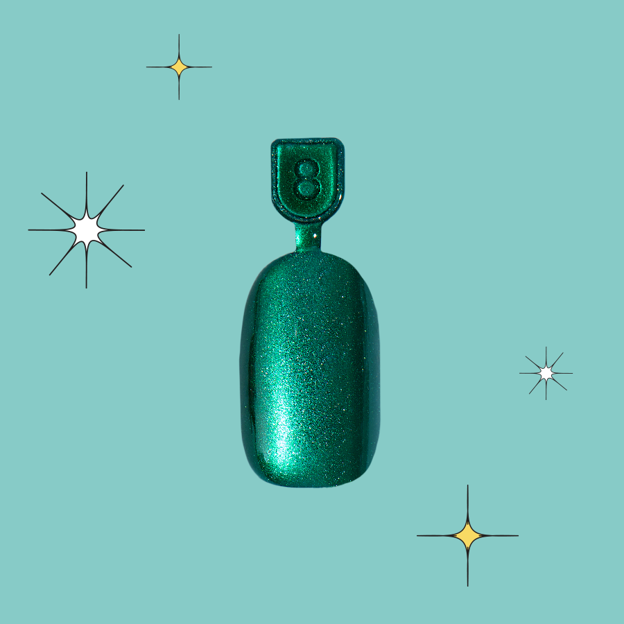 Emerald Magic Velvet - Pressies | Short Medium | Round showing shimmering deep green press-on nail sample on teal background