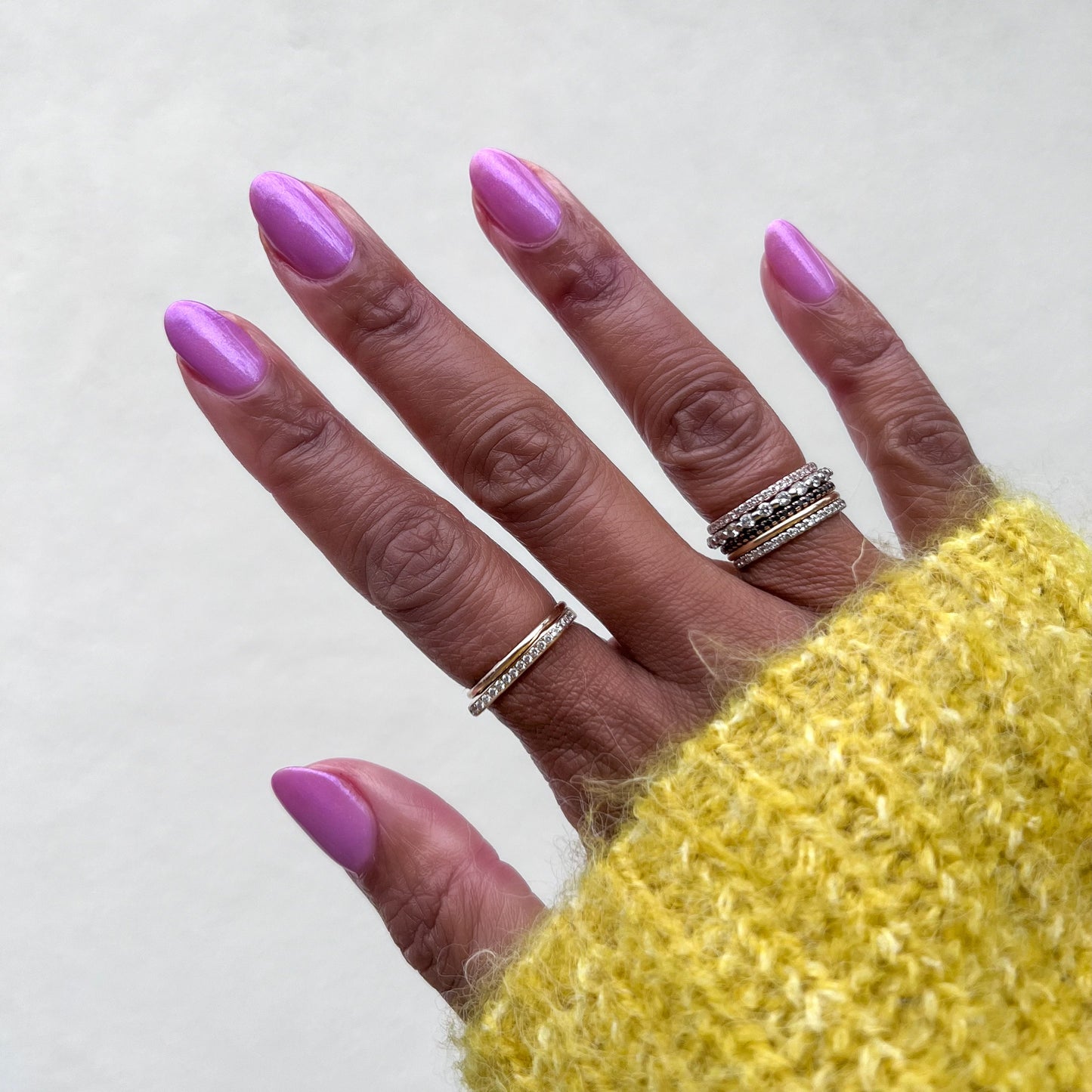 Island Time gel polish on natural nails in a subtle lilac shimmer for a smooth, long-lasting at-home manicure by Olive and June