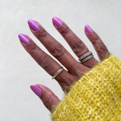 Island Time gel polish on natural nails in a subtle lilac shimmer for a smooth, long-lasting at-home manicure by Olive and June