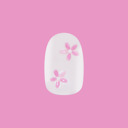 Puffy Petal Iridescent - Press-On | Short | Round sheer nail with iridescent finish and raised pink floral design